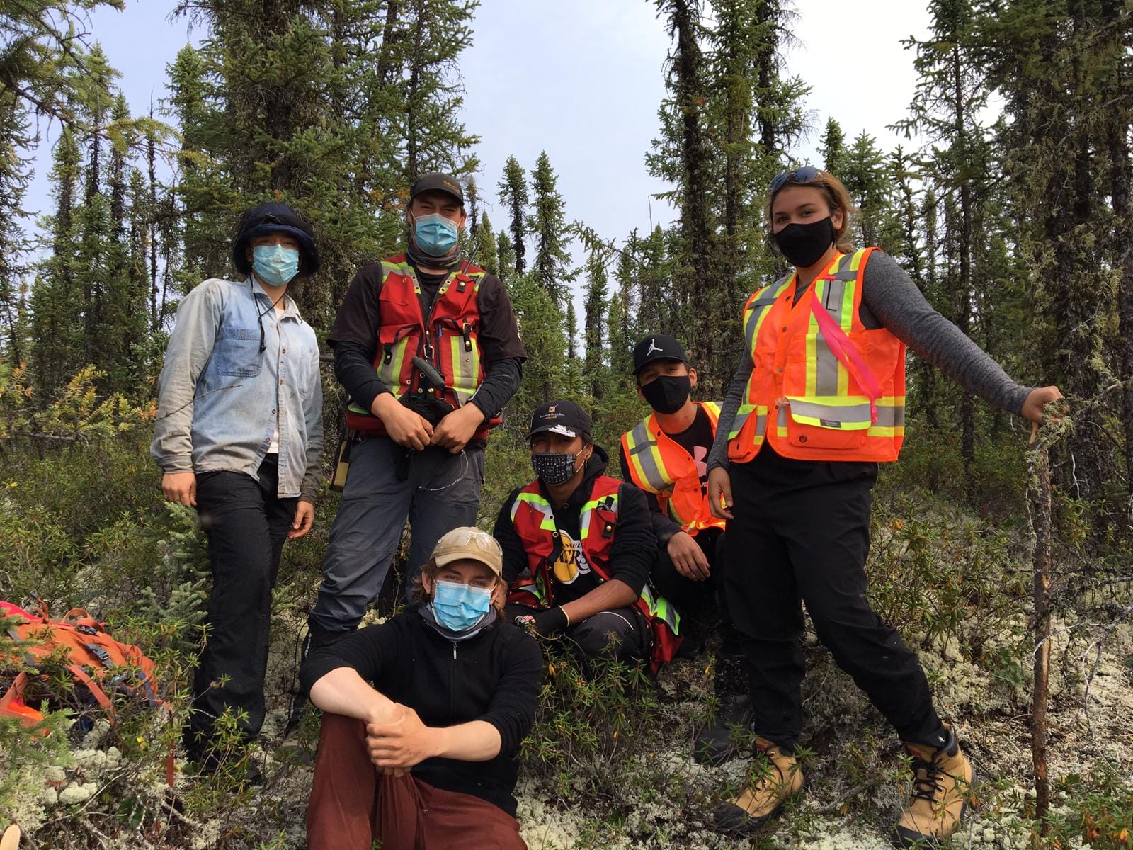 Group of people posing for photo near LLGP site