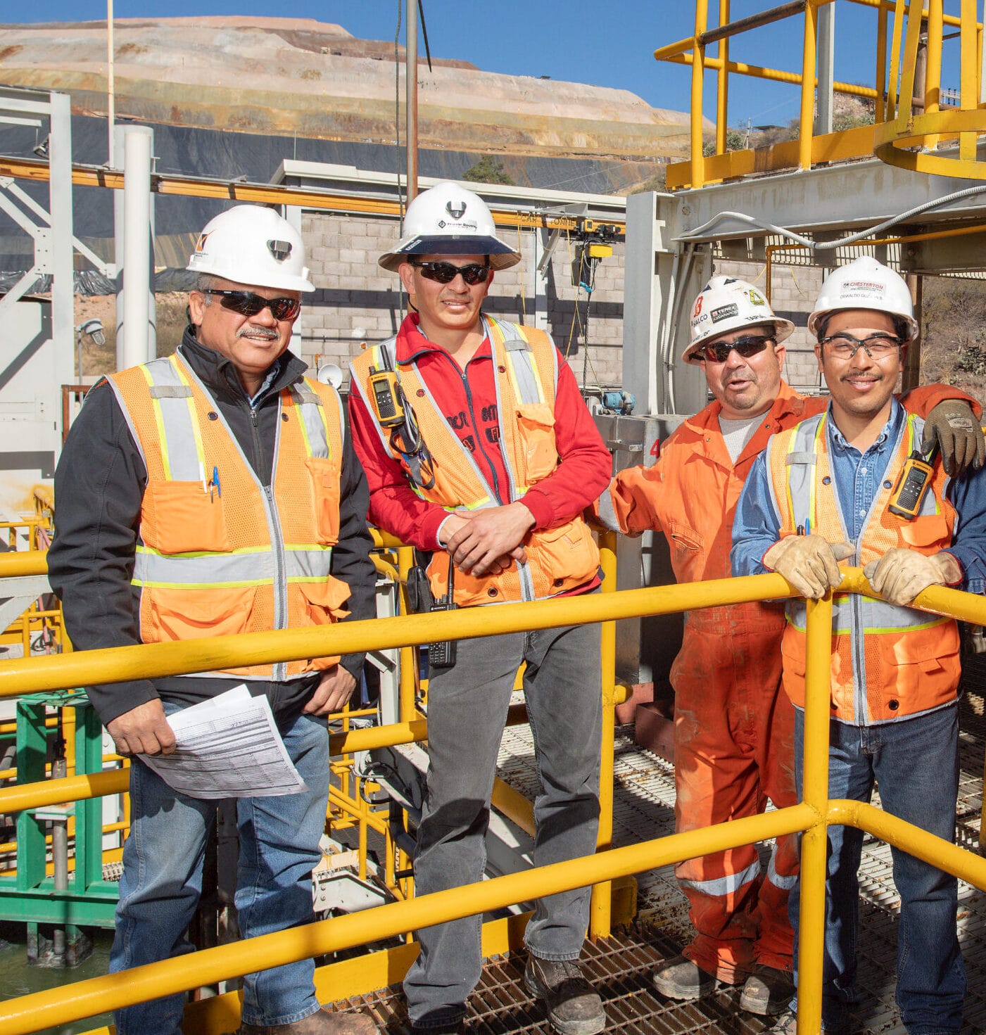 Group of four people standing outside at Mulatos Mine